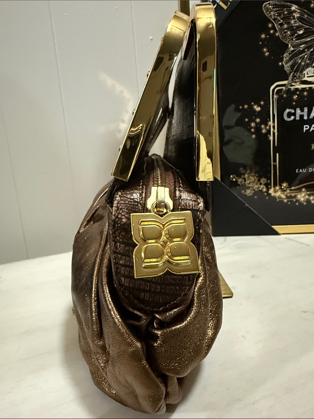 BCBGMAX Azria Bronze Metallic Pleated Wristlet Clutch with Gold Accents - Picture 8 of 11